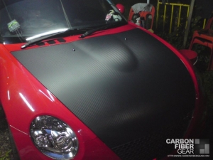 Hood wrapped in 3M DI-NOC carbon fiber vinyl