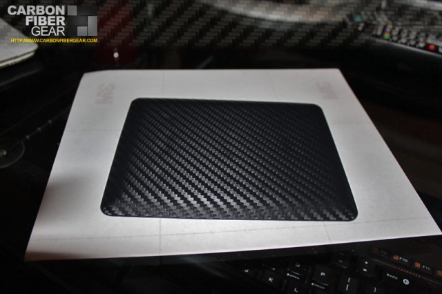 Light switch panel covered in 3M carbon fiber DI-NOC
