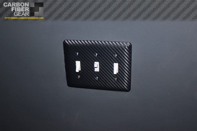 Light switch panel covered in 3M carbon fiber DI-NOC