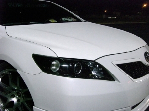 Toyota Camry with white carbon fiber DI-NOC wrapped hood